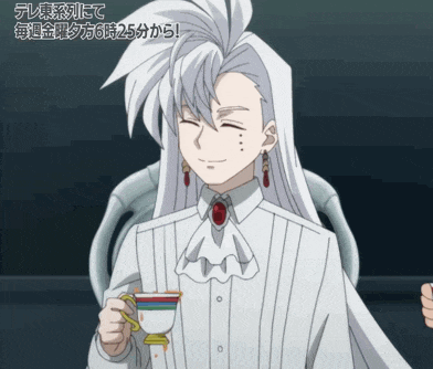 a man with long white hair holds a cup of tea