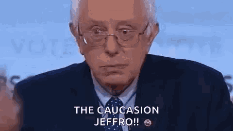 a man in a suit and tie is giving a speech and says `` the caucasion jeffro ! ''