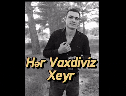 a black and white photo of a man with the words her vaxdiviz xeyr on the bottom