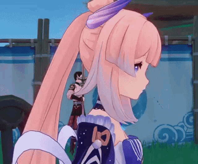 a girl with long pink hair is standing in a field with a man standing behind her .