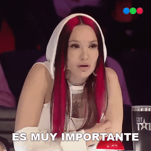 a woman with red hair says es muy importante in spanish