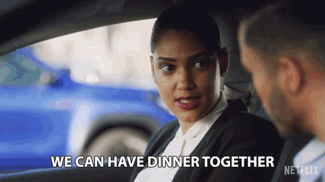 a woman sitting in a car with the words we can have dinner together