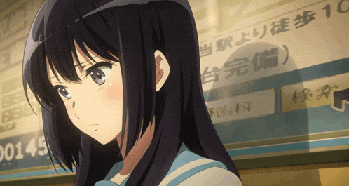 a girl with long black hair is standing in front of a sign that says 045