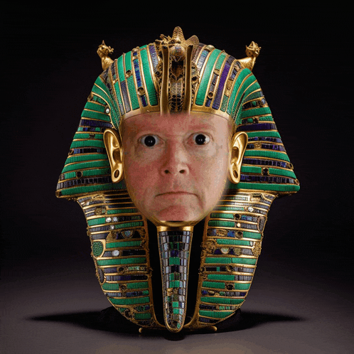 a statue of a pharaoh with a man 's face in it