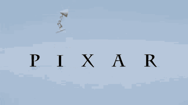 a pixar logo with a lamp in the middle of it