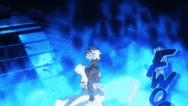a person is standing in a dark room with a blue light coming from the ceiling .