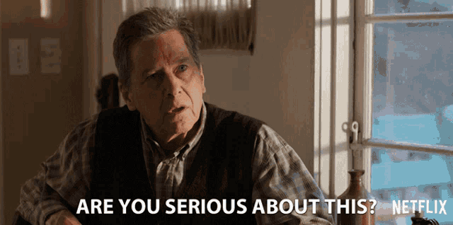 an older man sitting at a table says " are you serious about this netflix "