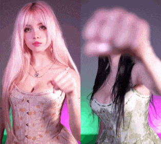 a girl with pink hair and a girl with black hair are standing next to each other