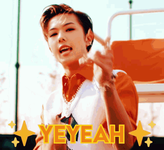 a young man giving a peace sign with the words yeyeah written above him