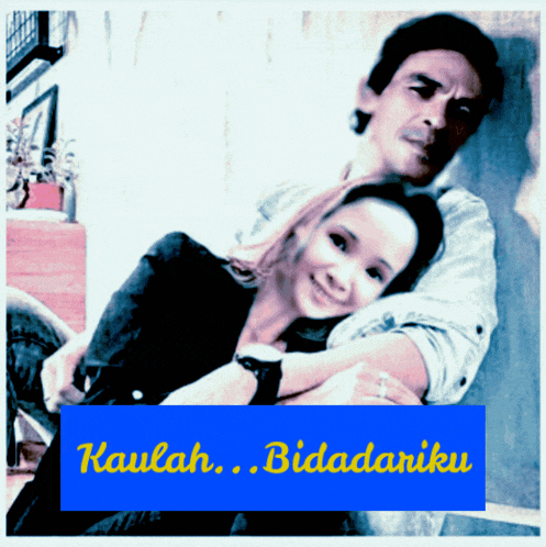 a picture of a man and a woman with the words kaulah bidadariku on the bottom