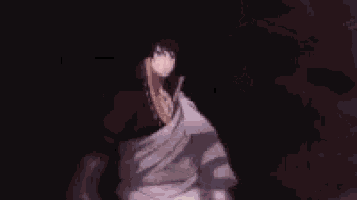 a close up of a person holding a knife in their hand .
