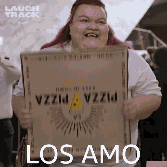 a woman holding a pizza box that says vzzii pizza