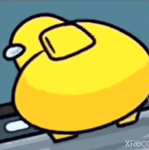 a close up of a yellow among us character standing on a table .