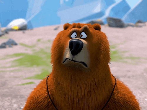 a brown bear with a necklace around its neck