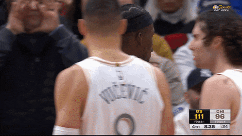 a basketball player wearing a jersey that says vicevic