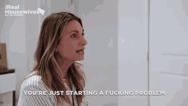 a woman is talking about starting a fucking problem