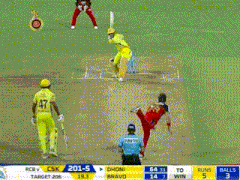 a cricket game is being played on a field with a vivo ad in the background