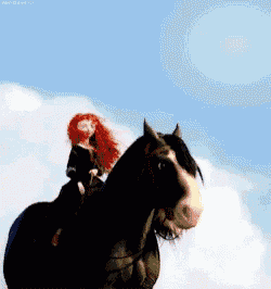 a woman with red hair is riding a black horse