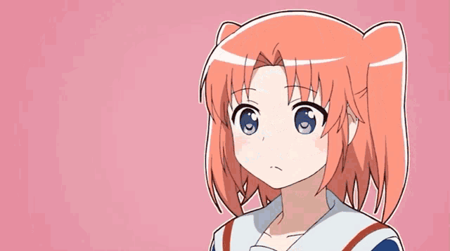 a girl with red hair and blue eyes is covering her mouth