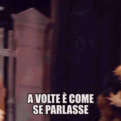 a blurred image of a person saying " a volte e come se parlasse "