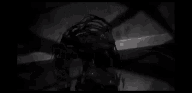 a black and white drawing of a monster in the dark .