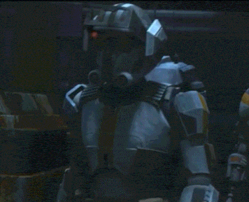 a robot with a helmet on is standing in a dark room talking on a cell phone .