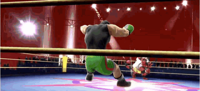 a man is boxing another man in a video game .