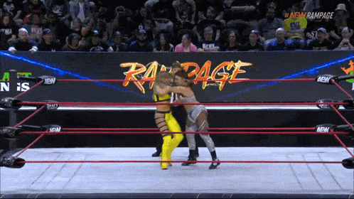 two women wrestle in a ring with a banner that says rampage on it