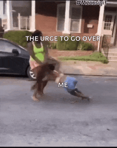 a woman is pushing a child down a street with the words the urge to go over me