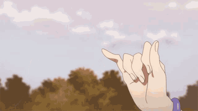 a person with a purple bracelet on their wrist is making a promise