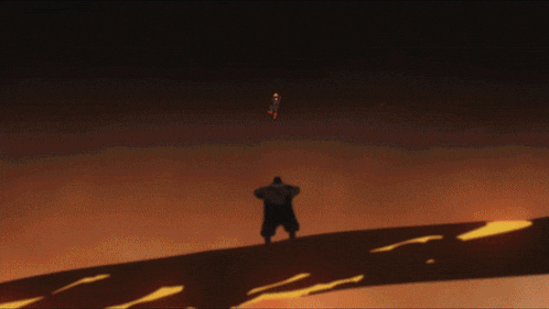 a silhouette of a man standing in a dark room with a sword in his hand