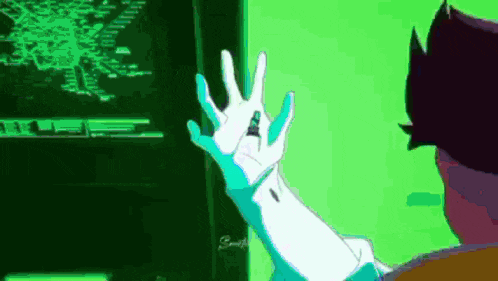 a man in a white glove is waving his hand in front of a computer screen .