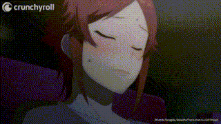 a woman with red hair is sitting in a chair with her eyes closed and her mouth open .