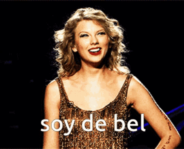 a woman in a leopard print dress is smiling and says soy de bel