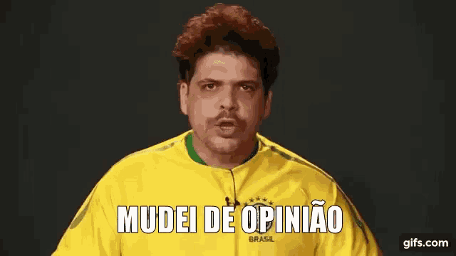 a man is wearing a yellow shirt that says brasil