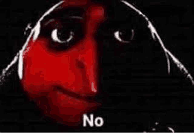 a close up of a person 's face with a red face and the words `` no '' written on it .