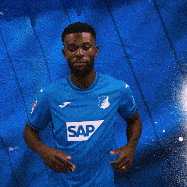 a man in a blue shirt with the word sap on the front