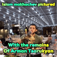 a picture of a man eating food with the words islam makhachev pictured with the remains of arman tsarkyan