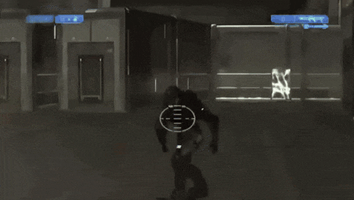 a man in a red suit is holding a gun