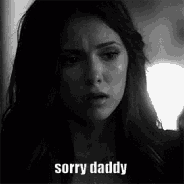 a black and white photo of a woman saying sorry daddy .