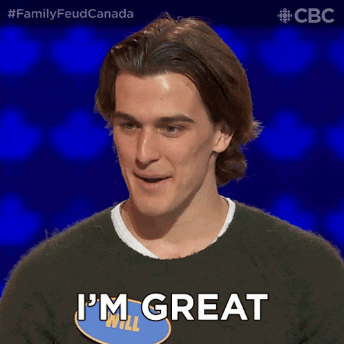 a man wearing a sweater that says i 'm great on it