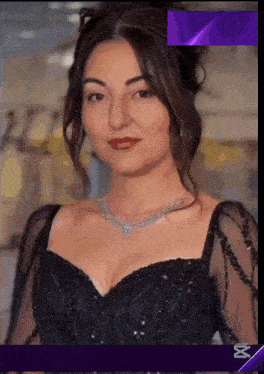 a woman wearing a black dress and a necklace with a purple background