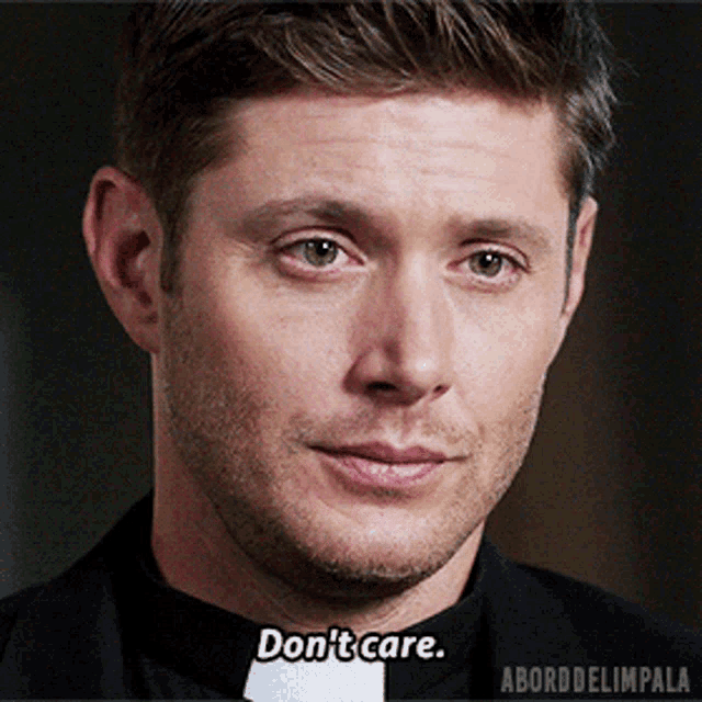 a close up of a man 's face with a caption that says don 't care