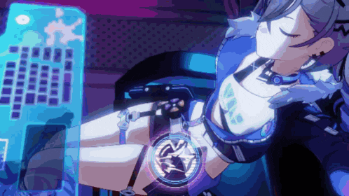 a girl in a blue and white outfit is laying down in front of a computer