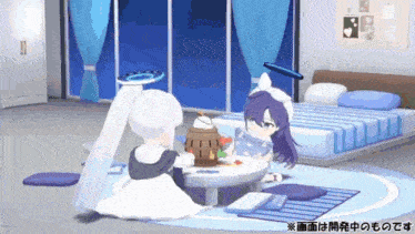 two anime characters are sitting at a table in a bedroom with a bed .