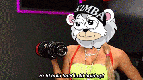 a woman holding a dumbbell with a cartoon bear on her head that says " hold hold hold hold hold up "