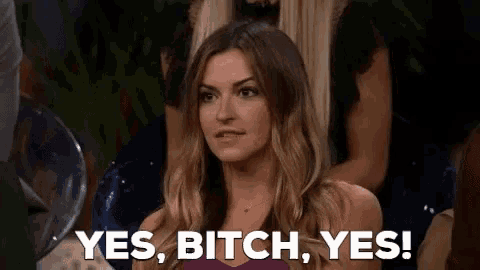 a woman is sitting in a chair and says yes , bitch , yes !