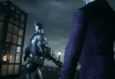 a man in a purple suit stands next to a batman