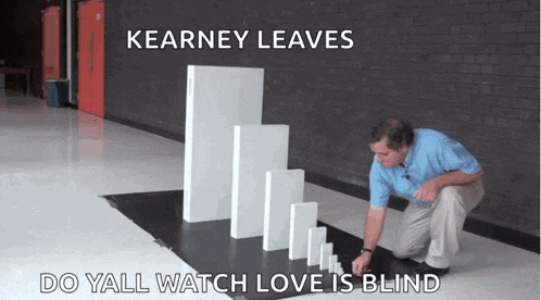a man playing with dominoes in a hallway with the caption kearney leaves