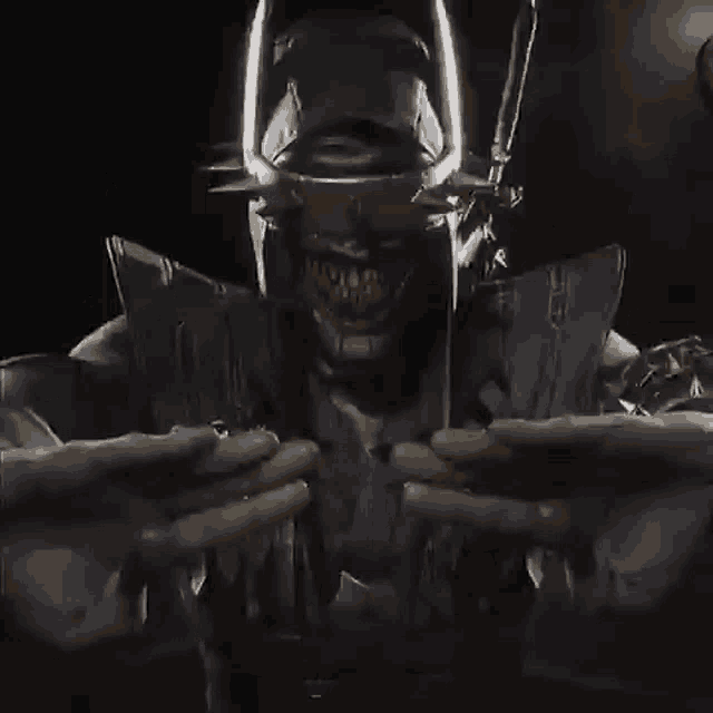 a statue of the laughing batman is holding a sword